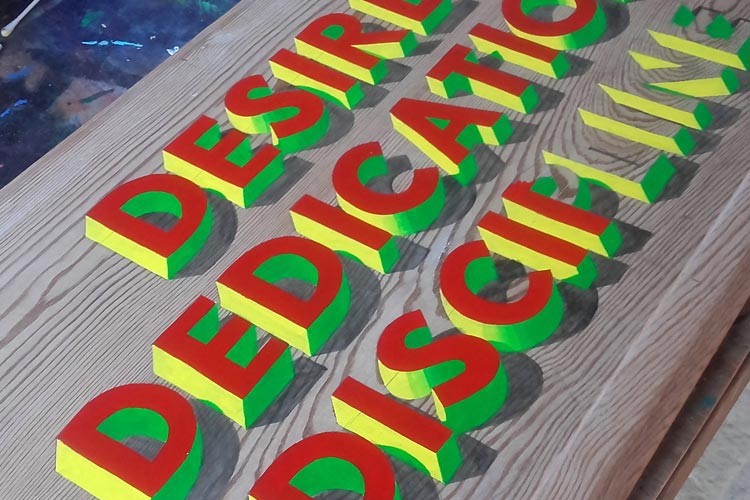 Colourful faux 3D lettering on wood painted by Jill Strong